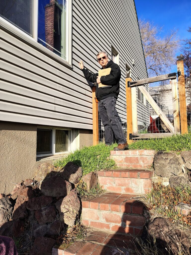 Energy Trust of Oregon Home Energy Auditor Dave Dahlin does his stuff