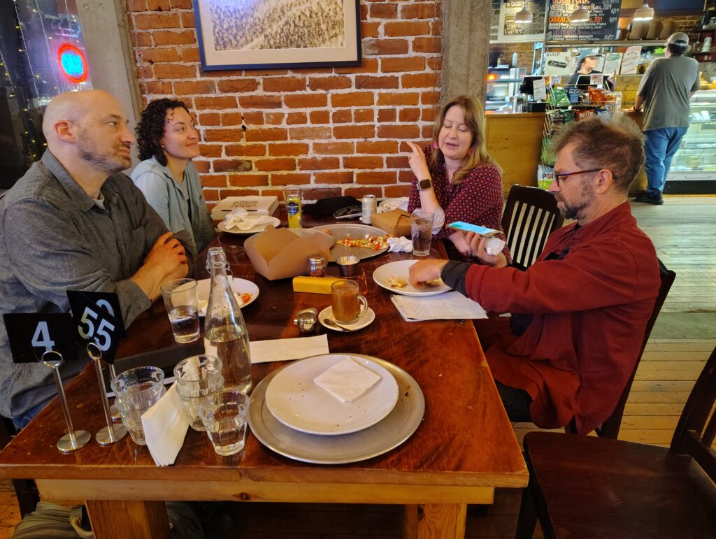 Vernacular Architecture Forum Conference coordinators Phil Gruen,  Julia Griffith and Amanda Clark discussing architecture at Great Pacific with Eastern Oregon Living editor Josh Brown.